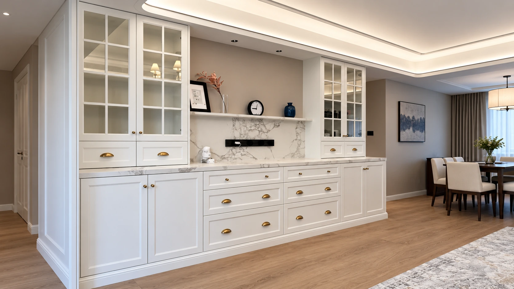 Classic white built-in cabinetry with glass-front display cabinets, brass hardware and integrated storage in a Shanghai residence.